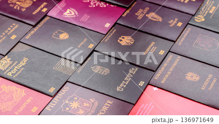 Passports of citizens of different countries of the world. Passports background Passports of citizens of different countries of the world. Passports background 136971649