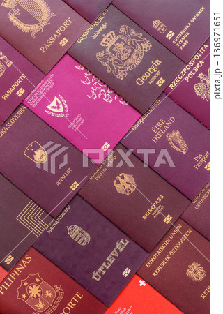 Passports of citizens of different countries of the world. Passports background 136971651
