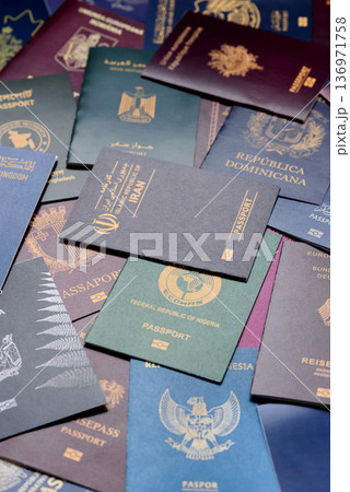 Passports of citizens of different countries of the world. Passports background 136971758