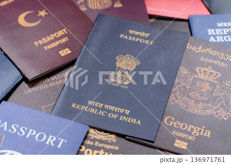 Passports of citizens of different countries of the world. Passports background 136971761