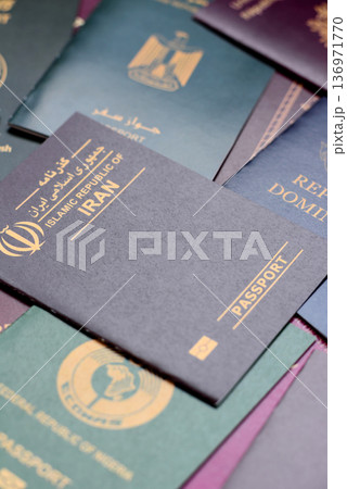 Passports of citizens of different countries of the world. Passports background 136971770