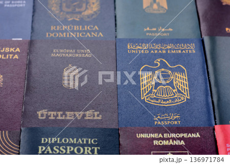Passports of citizens of different countries of the world. Passports background Passports of citizens of different countries of the world. Passports background 136971784