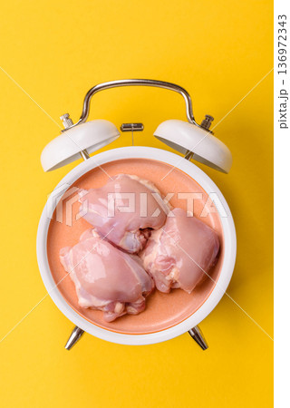 Chicken thigh fillet, skinless and boneless meat for grilling or barbecue. Chicken thigh fillet Chicken thigh fillet, skinless and boneless meat for grilling or barbecue. Chicken thigh fillet 136972343