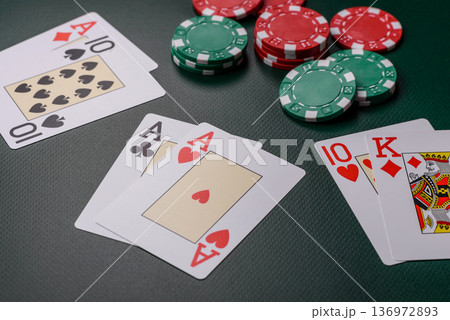 Casino, cards and chips on a colored background, poker and blackjack, gambling. Cards and chips 136972893