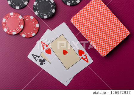 Casino, cards and chips on a colored background, poker and blackjack, gambling. Cards and chips 136972937
