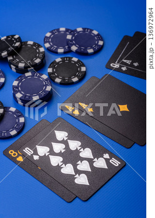 Casino, cards and chips on a colored background, poker and blackjack, gambling. Cards and chips Casino, cards and chips on a colored background, poker and blackjack, gambling. Cards and chips 136972964