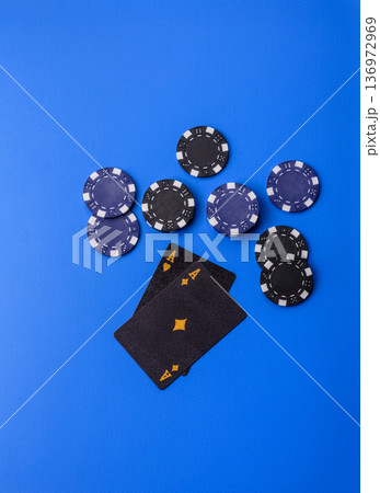 Casino, cards and chips on a colored background, poker and blackjack, gambling. Cards and chips 136972969