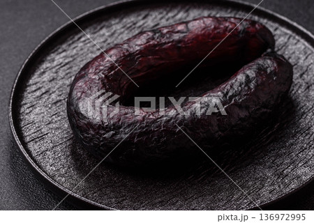 Homemade pork or beef sausage rings with garlic and spices. A homemade sausage ring Homemade pork or beef sausage rings with garlic and spices. A homemade sausage ring 136972995