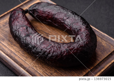 Homemade pork or beef sausage rings with garlic and spices. A homemade sausage ring 136973015