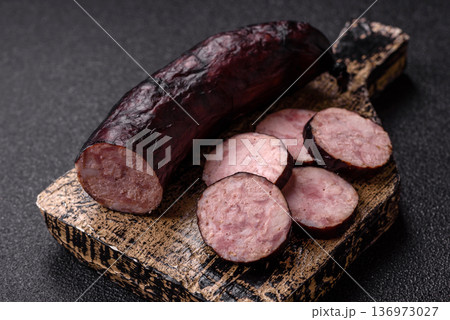 Homemade pork or beef sausage rings with garlic and spices. A homemade sausage ring 136973027