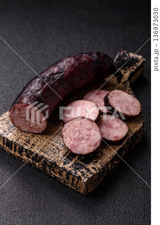 Homemade pork or beef sausage rings with garlic and spices. A homemade sausage ring Homemade pork or beef sausage rings with garlic and spices. A homemade sausage ring 136973030