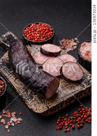 Homemade pork or beef sausage rings with garlic and spices. A homemade sausage ring Homemade pork or beef sausage rings with garlic and spices. A homemade sausage ring 136973034
