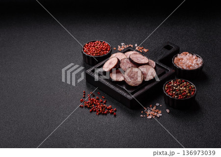 Homemade pork or beef sausage rings with garlic and spices. A homemade sausage ring 136973039