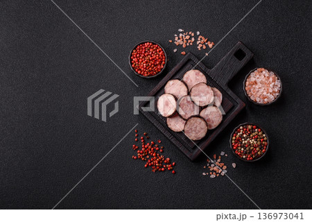 Homemade pork or beef sausage rings with garlic and spices. A homemade sausage ring Homemade pork or beef sausage rings with garlic and spices. A homemade sausage ring 136973041