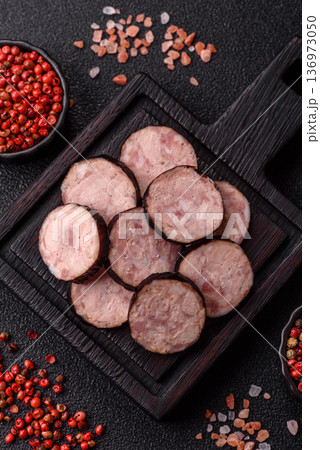 Homemade pork or beef sausage rings with garlic and spices. A homemade sausage ring Homemade pork or beef sausage rings with garlic and spices. A homemade sausage ring 136973050
