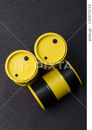 Metal barrels containing oil, gas, or chemicals, global fuel prices, and trends. Oil barrels 136973218