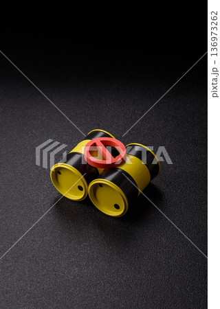 Metal barrels containing oil, gas, or chemicals, with a prohibition sign. Oil barrels Metal barrels containing oil, gas, or chemicals, with a prohibition sign. Oil barrels 136973262