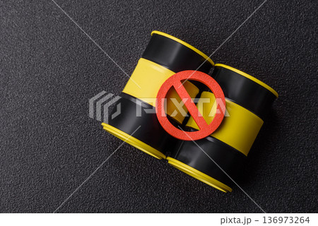Metal barrels containing oil, gas, or chemicals, with a prohibition sign. Oil barrels Metal barrels containing oil, gas, or chemicals, with a prohibition sign. Oil barrels 136973264