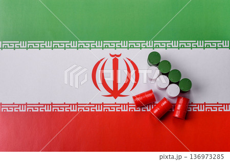Metal barrels of oil, gas, or chemicals on the Iranian flag, Iran production. Barrels of Iranian oil 136973285