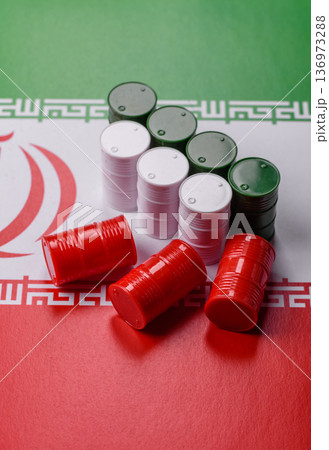 Metal barrels of oil, gas, or chemicals on the Iranian flag, Iran production. Barrels of Iranian oil 136973288