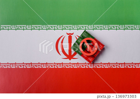 Barrels of oil, gas, or chemicals bearing the Iranian flag and a ban sign. Barrels of Iranian oil Barrels of oil, gas, or chemicals bearing the Iranian flag and a ban sign. Barrels of Iranian oil 136973303