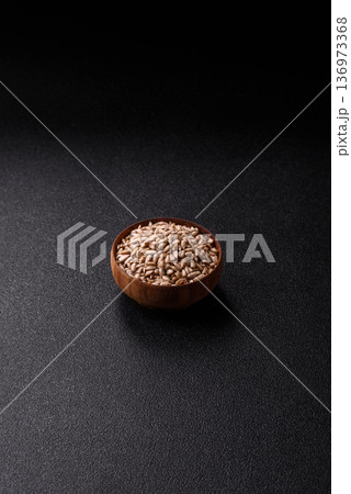 Shelled sunflower seed kernels, salted, roasted, or raw, are a healthy ingredient. Sunflower seeds 136973368