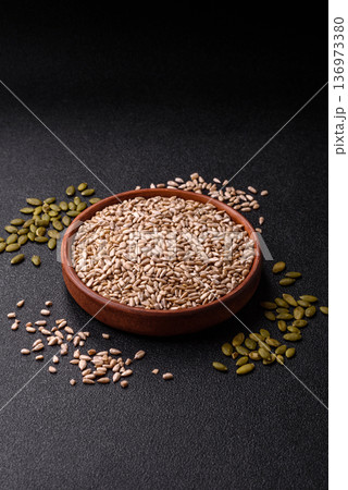 Shelled sunflower seed kernels, salted, roasted, or raw, are a healthy ingredient. Sunflower seeds Shelled sunflower seed kernels, salted, roasted, or raw, are a healthy ingredient. Sunflower seeds 136973380