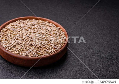 Shelled sunflower seed kernels, salted, roasted, or raw, are a healthy ingredient. Sunflower seeds Shelled sunflower seed kernels, salted, roasted, or raw, are a healthy ingredient. Sunflower seeds 136973384