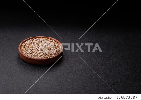 Shelled sunflower seed kernels, salted, roasted, or raw, are a healthy ingredient. Sunflower seeds Shelled sunflower seed kernels, salted, roasted, or raw, are a healthy ingredient. Sunflower seeds 136973387
