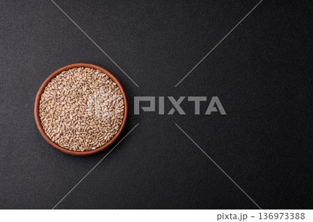Shelled sunflower seed kernels, salted, roasted, or raw, are a healthy ingredient. Sunflower seeds Shelled sunflower seed kernels, salted, roasted, or raw, are a healthy ingredient. Sunflower seeds 136973388
