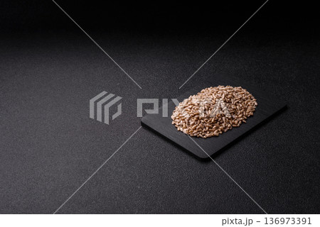 Shelled sunflower seed kernels, salted, roasted, or raw, are a healthy ingredient. Sunflower seeds Shelled sunflower seed kernels, salted, roasted, or raw, are a healthy ingredient. Sunflower seeds 136973391