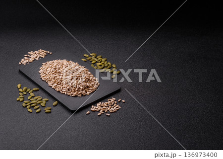 Shelled sunflower seed kernels, salted, roasted, or raw, are a healthy ingredient. Sunflower seeds 136973400