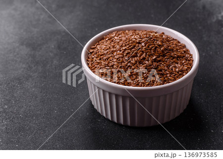 Flaxseed as an ingredient for oil, organic flour, and healthy foods. Flax seeds Flaxseed as an ingredient for oil, organic flour, and healthy foods. Flax seeds 136973585