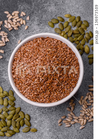 Flaxseed as an ingredient for oil, organic flour, and healthy foods. Flax seeds Flaxseed as an ingredient for oil, organic flour, and healthy foods. Flax seeds 136973589