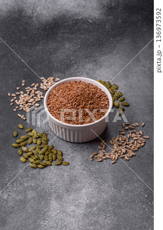 Flaxseed as an ingredient for oil, organic flour, and healthy foods. Flax seeds 136973592