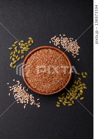 Flaxseed as an ingredient for oil, organic flour, and healthy foods. Flax seeds Flaxseed as an ingredient for oil, organic flour, and healthy foods. Flax seeds 136973594