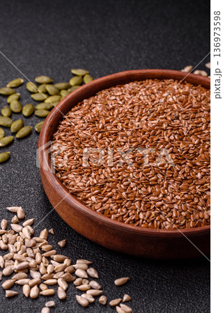 Flaxseed as an ingredient for oil, organic flour, and healthy foods. Flax seeds 136973598