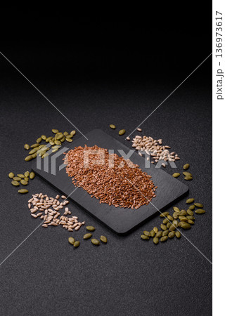 Flaxseed as an ingredient for oil, organic flour, and healthy foods. Flax seeds Flaxseed as an ingredient for oil, organic flour, and healthy foods. Flax seeds 136973617