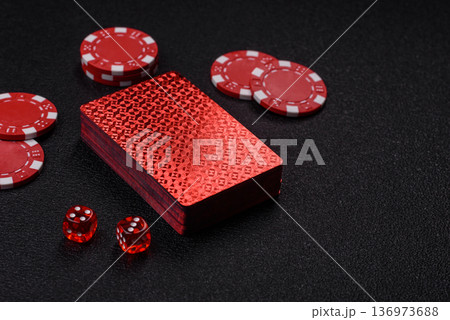 Casino, cards and chips on a colored background, poker and blackjack. Cards and chips 136973688