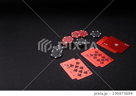 Casino, cards and chips on a colored background, poker and blackjack. Cards and chips 136973694