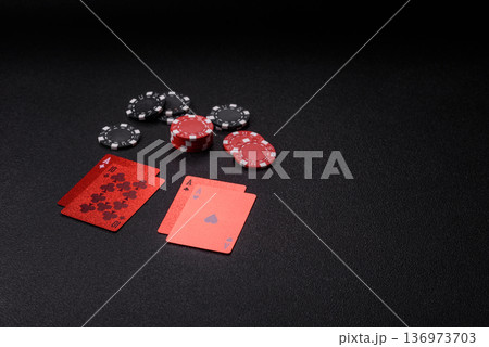 Casino, cards and chips on a colored background, poker and blackjack. Cards and chips Casino, cards and chips on a colored background, poker and blackjack. Cards and chips 136973703