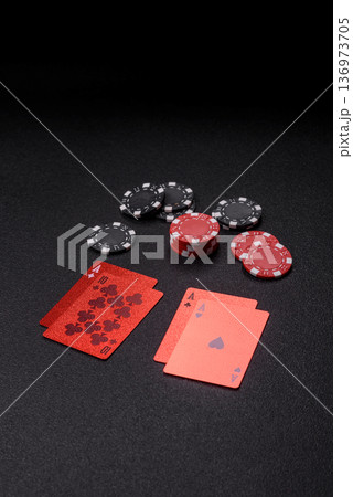 Casino, cards and chips on a colored background, poker and blackjack. Cards and chips 136973705