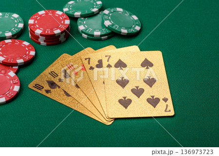 Casino, cards and chips on a colored background, poker and blackjack. Cards and chips Casino, cards and chips on a colored background, poker and blackjack. Cards and chips 136973723