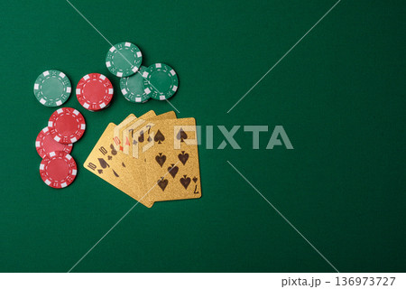 Casino, cards and chips on a colored background, poker and blackjack. Cards and chips Casino, cards and chips on a colored background, poker and blackjack. Cards and chips 136973727