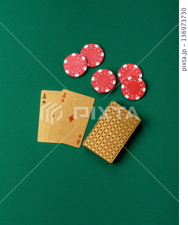 Casino, cards and chips on a colored background, poker and blackjack. Cards and chips Casino, cards and chips on a colored background, poker and blackjack. Cards and chips 136973730