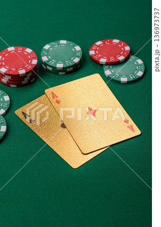 Casino, cards and chips on a colored background, poker and blackjack. Cards and chips 136973737
