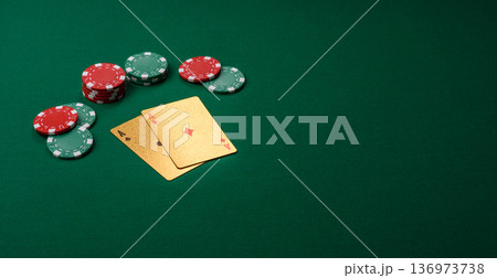 Casino, cards and chips on a colored background, poker and blackjack. Cards and chips Casino, cards and chips on a colored background, poker and blackjack. Cards and chips 136973738