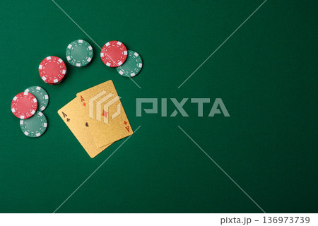 Casino, cards and chips on a colored background, poker and blackjack. Cards and chips 136973739