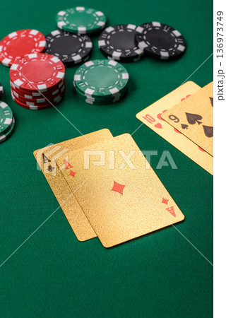 Casino, cards and chips on a colored background, poker and blackjack. Cards and chips 136973749