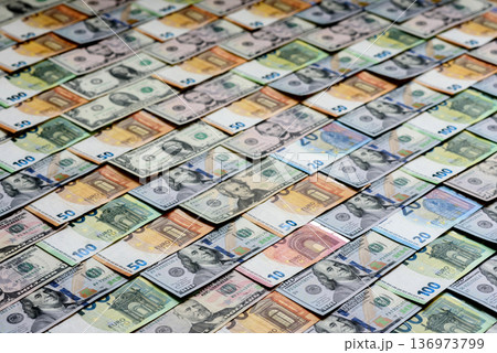Euro and dollar banknotes, exchange, sales, economic tariffs and taxes. Euros and dollars 136973799